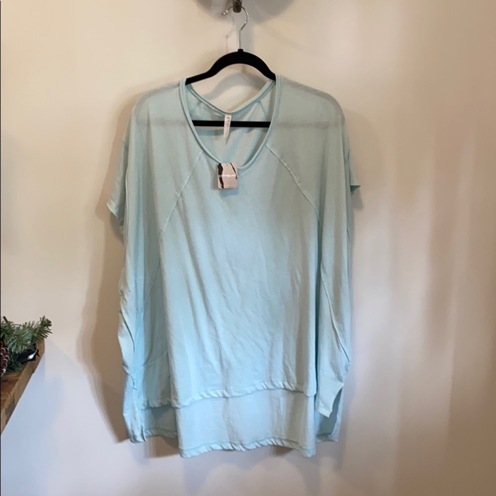 Free people city tee size XS tags on.